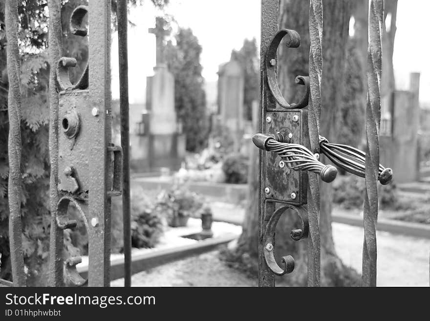 Gate to the cemetery, black and white