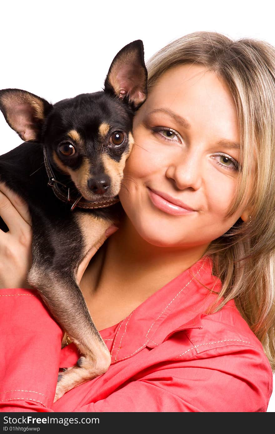 Young woman is embracing small dog (toy-terrier). Young woman is embracing small dog (toy-terrier)