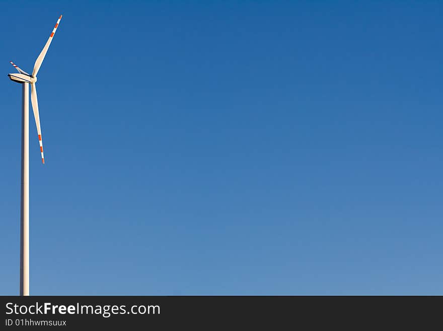 Windmill with Blue Sky in the background and space for text