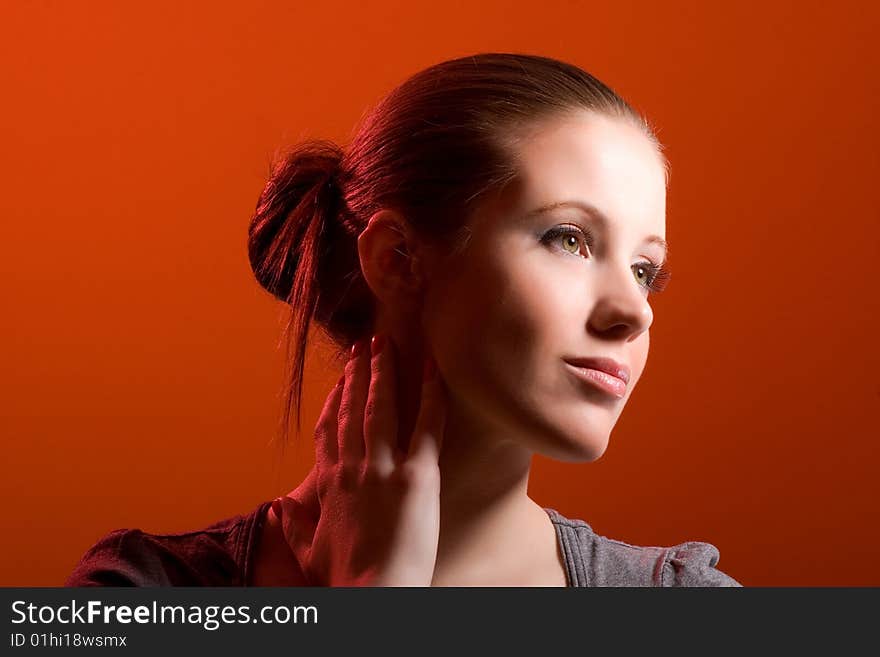 Woman on orange background