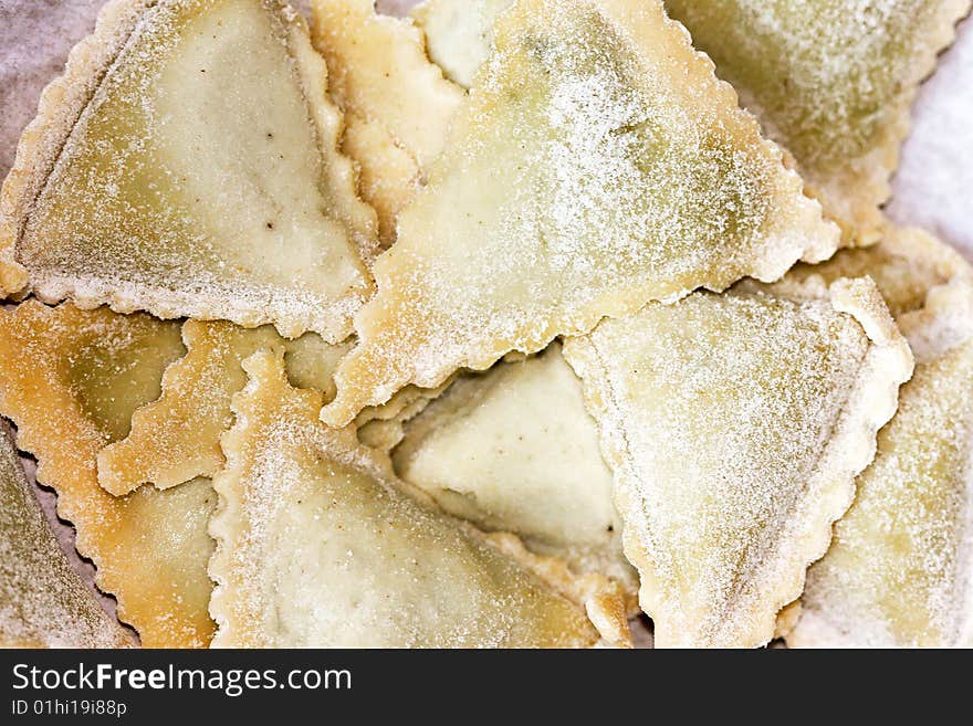 Close up shot of stuffed ravioli pasta. Close up shot of stuffed ravioli pasta