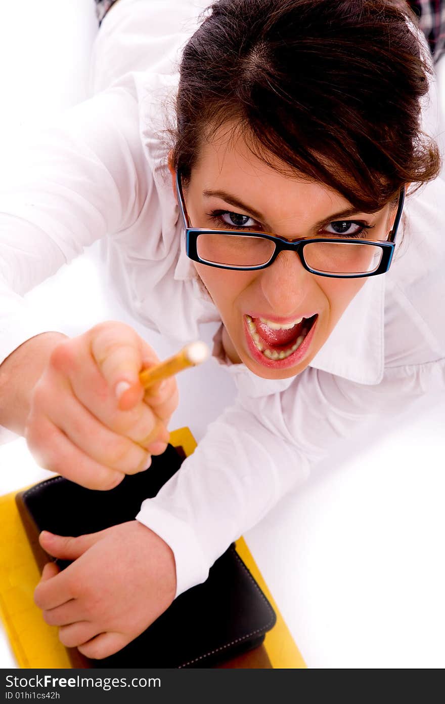 High angle view of shouting female pointing with pencil with white background