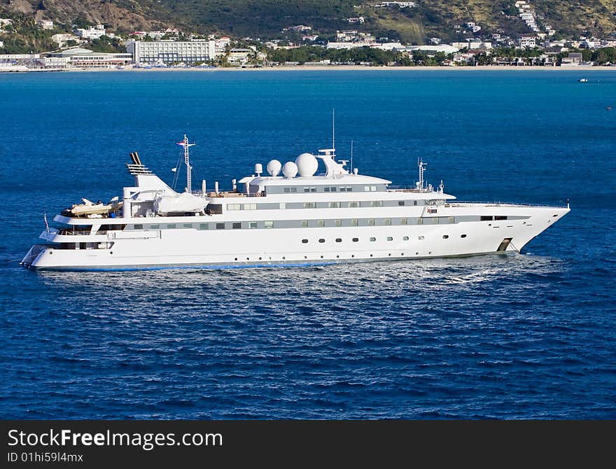 Large White Yacht in Blue Bay