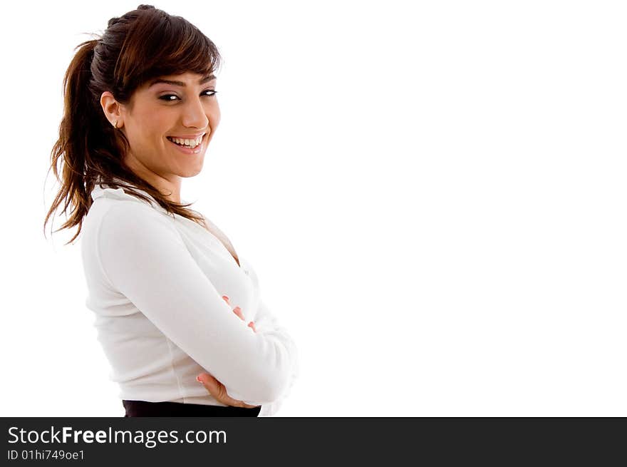 Side pose of smiling businesswoman on an isolated white background