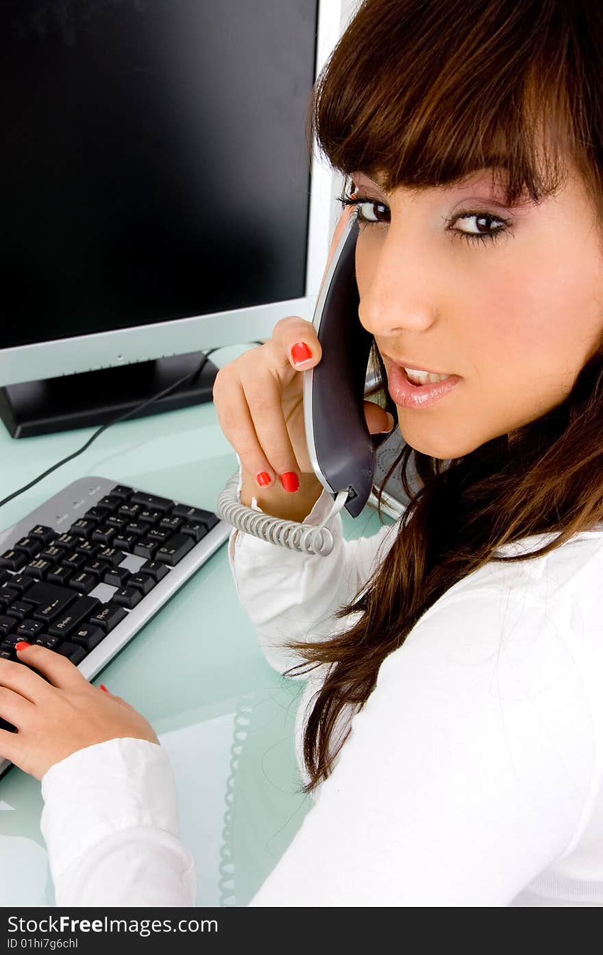 Side view of working woman in office