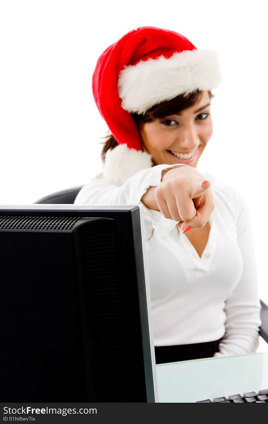 Front view of smiling christmas woman pointing