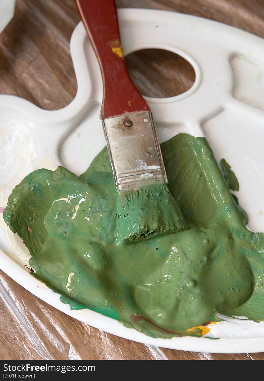 Brush with green paint