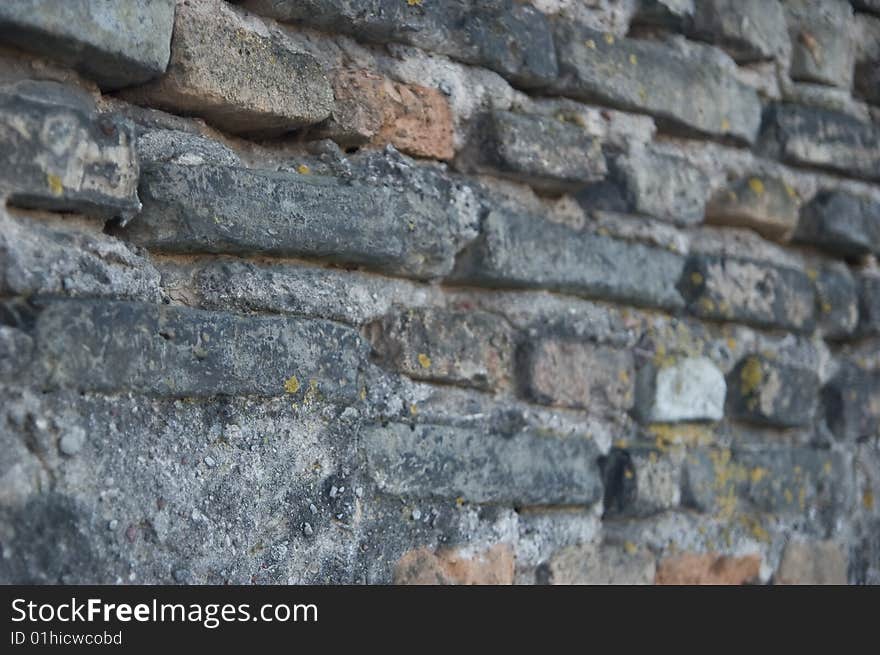 Old grey brick wall background