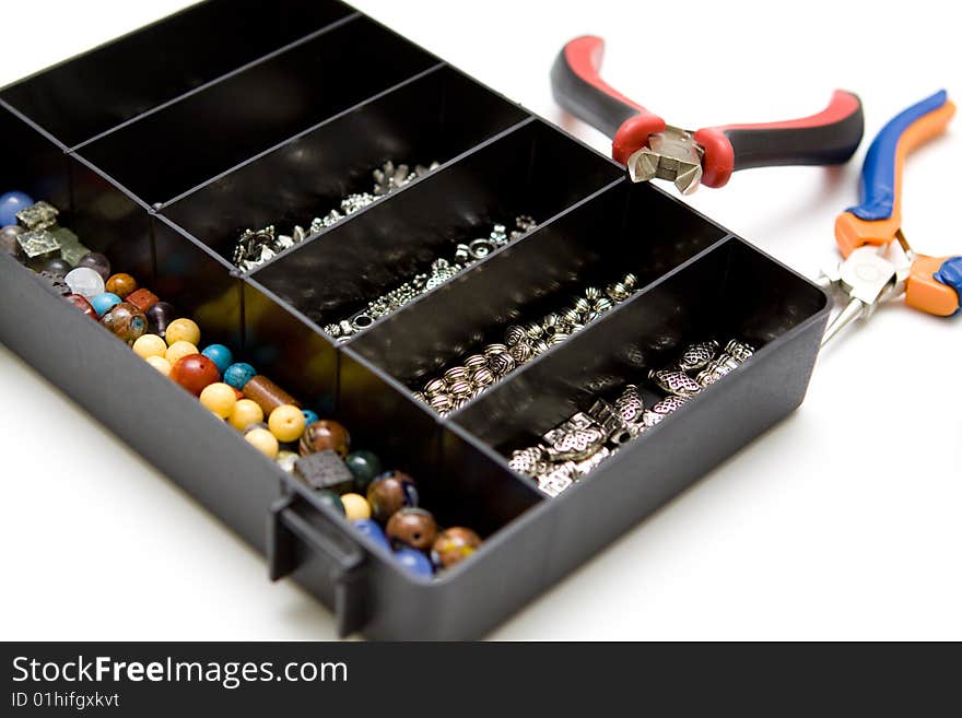 Jewellery making on a white background