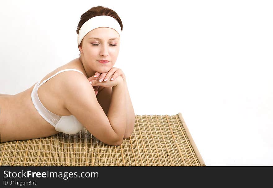 Woman in spa on white