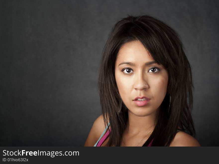 Close up portrait of a pretty brunette woman with copy space. Close up portrait of a pretty brunette woman with copy space