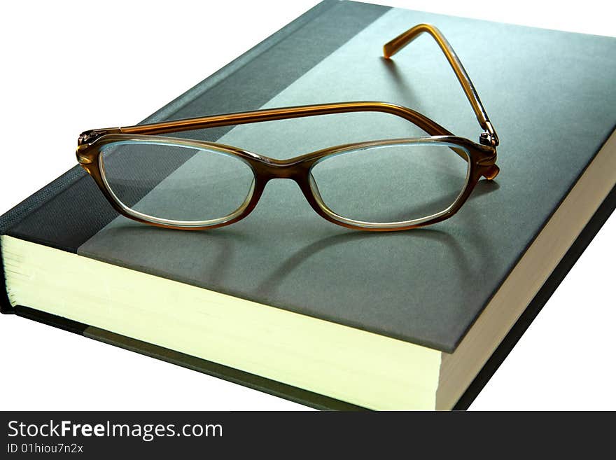 Book and eyglasses-close up