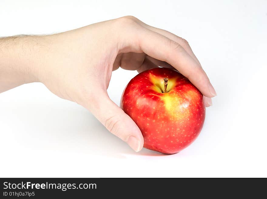 Fresh red apple in hand isolated on white background. Fresh red apple in hand isolated on white background