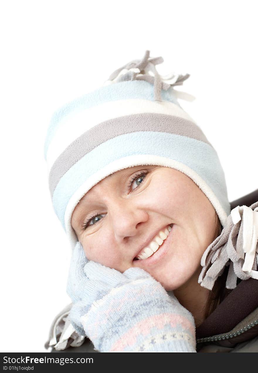 Yound smiling attractive woman in winter hat and gloves