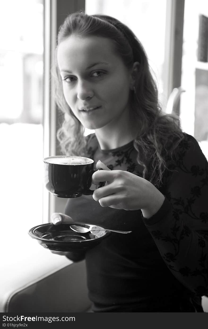 Woman with the cup of the coffee. Woman with the cup of the coffee