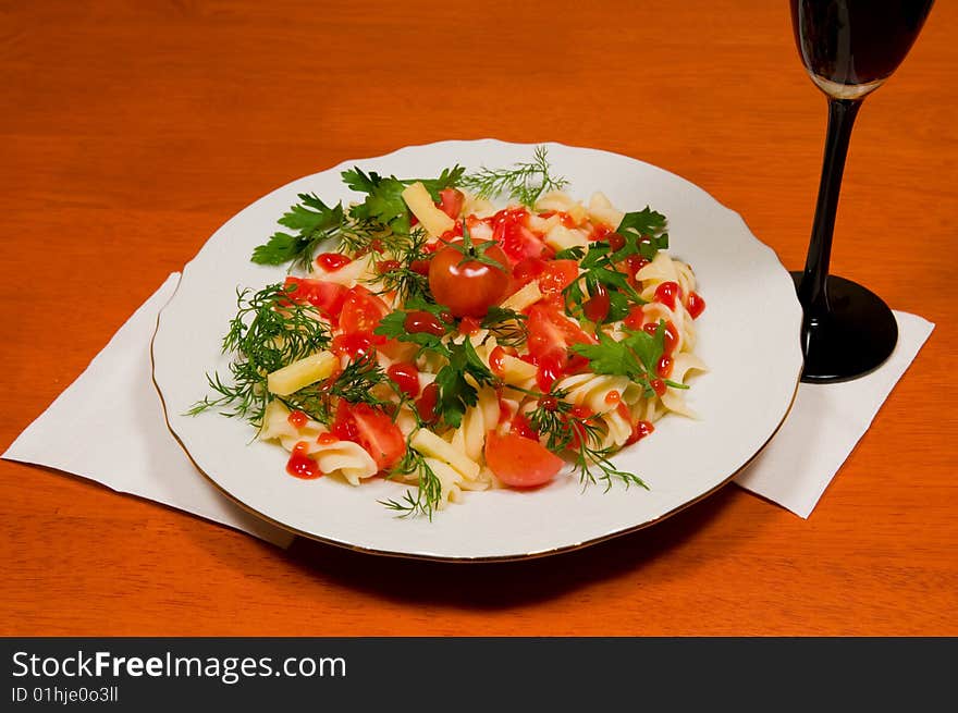 Italian Paste  With Vegetables And Glass Of Wine