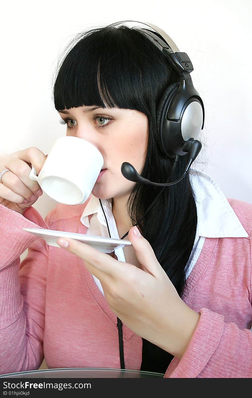 Business customer support operator woman with a cup of hot drink