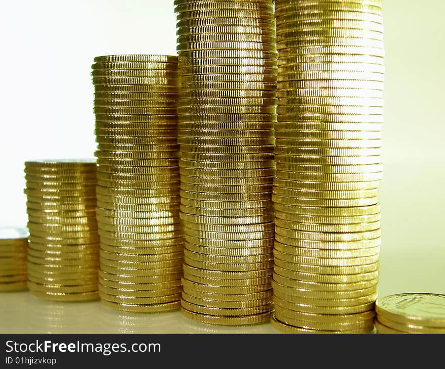 Folded Stack Of Coins In The Form Of Charts