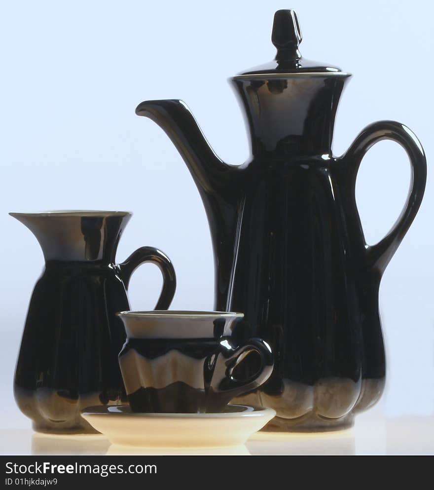 Black coffee service isolated on a white background. Black coffee service isolated on a white background