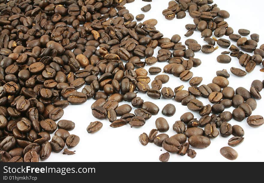 Coffee Beans spread on a white background. Coffee Beans spread on a white background