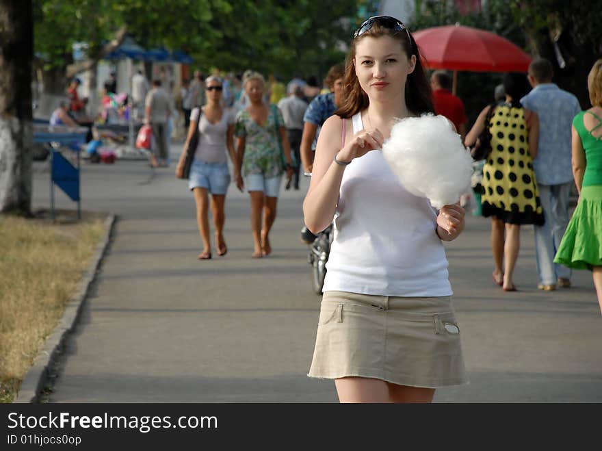 Woman Eating Cotton Candy