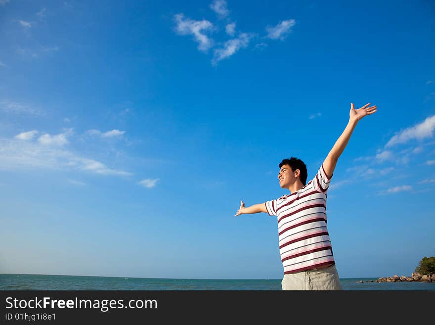 Young man by the beach