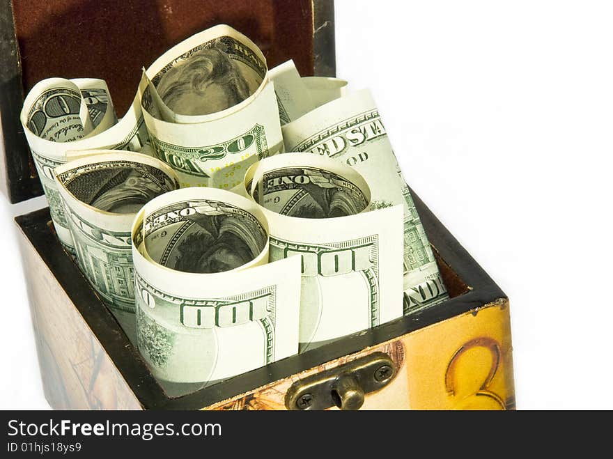 Brown chest full of  American dollars isolated in white background. Brown chest full of  American dollars isolated in white background