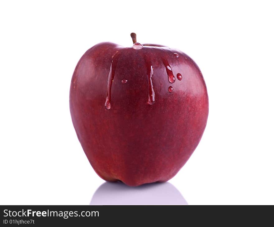 Red apple with drops isolated on white.Very high detail texture.