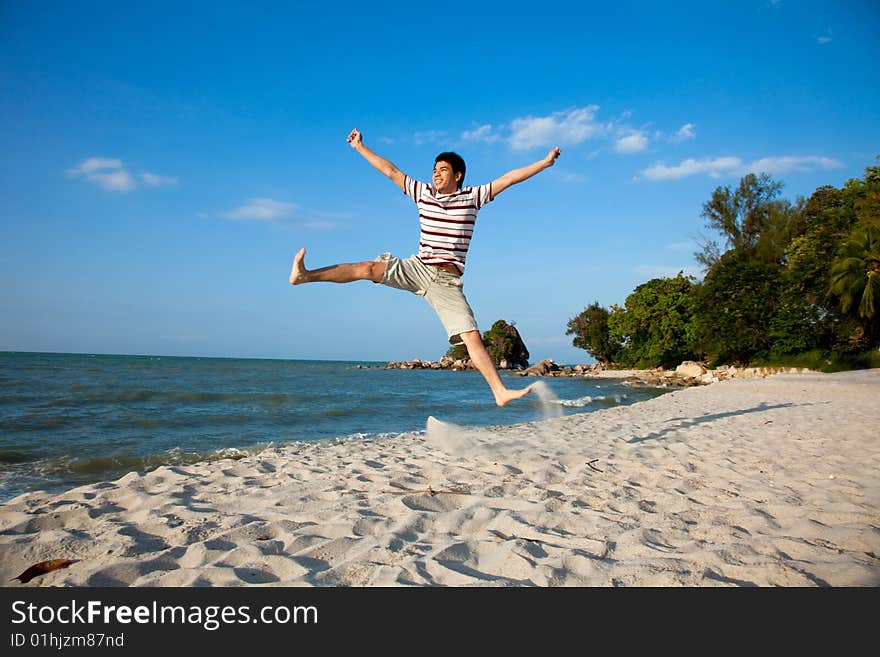 Young Man By The Beach