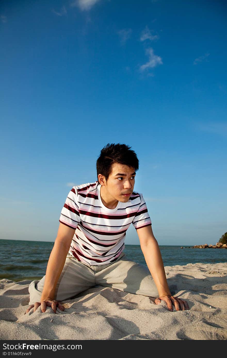 Young Man By The Beach