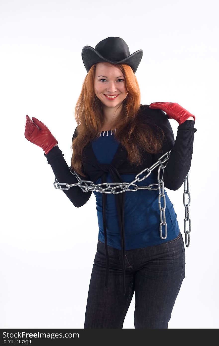 Young girl with red gloves, chain and black hat standing on white background. Young girl with red gloves, chain and black hat standing on white background