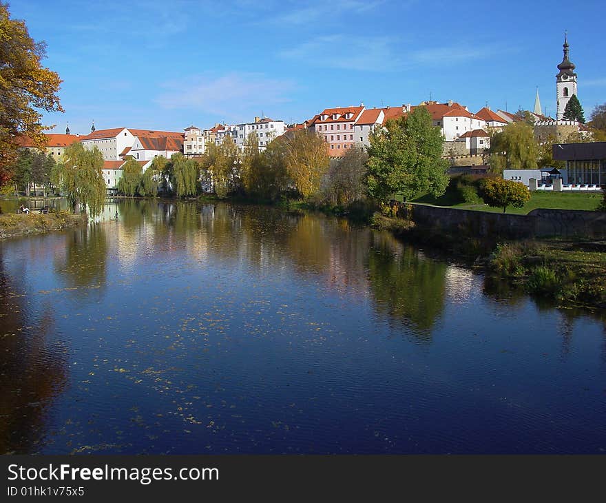 The old town Pisek on the river Otava with blue sky