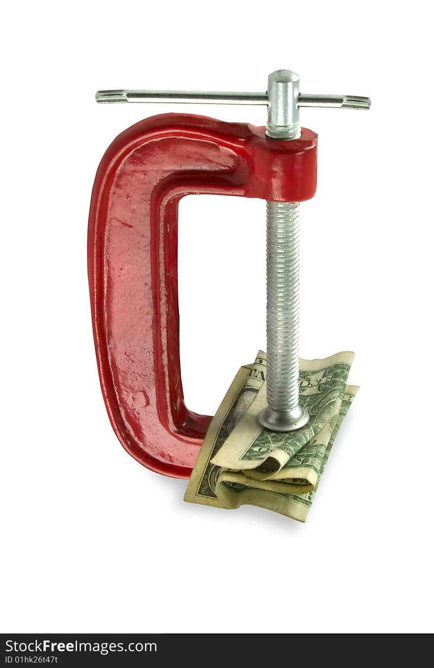 The dollar clamped by a red clamp. White background. The dollar clamped by a red clamp. White background.