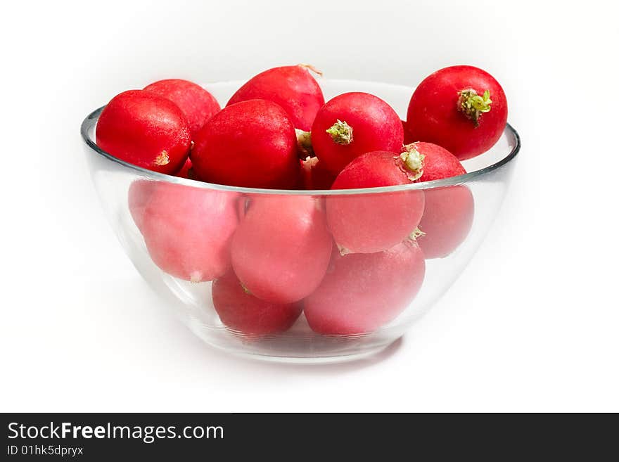 Plate of red radish vegetables isolated on white background