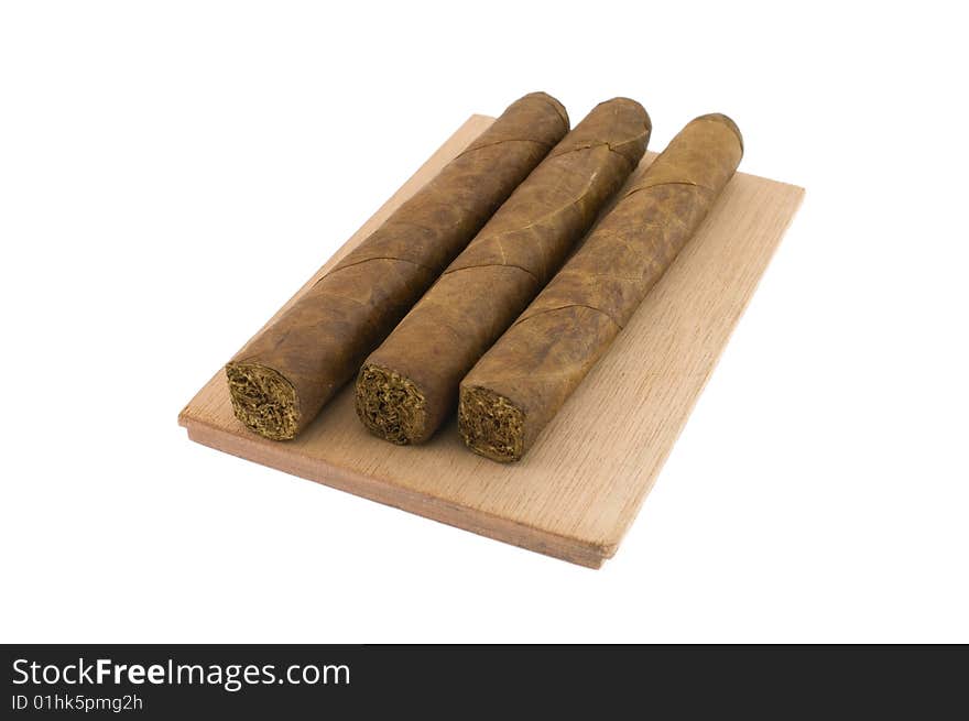 Three cigars isolated on white