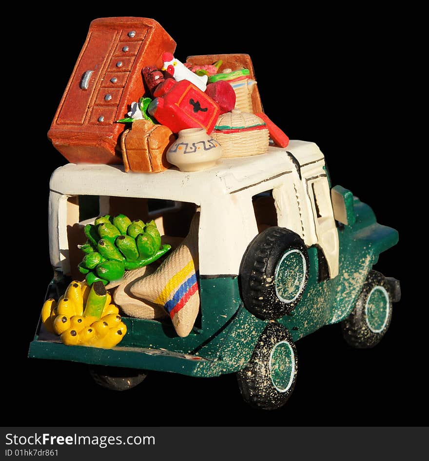 Colorfull model car with fruits and other objects. Colorfull model car with fruits and other objects