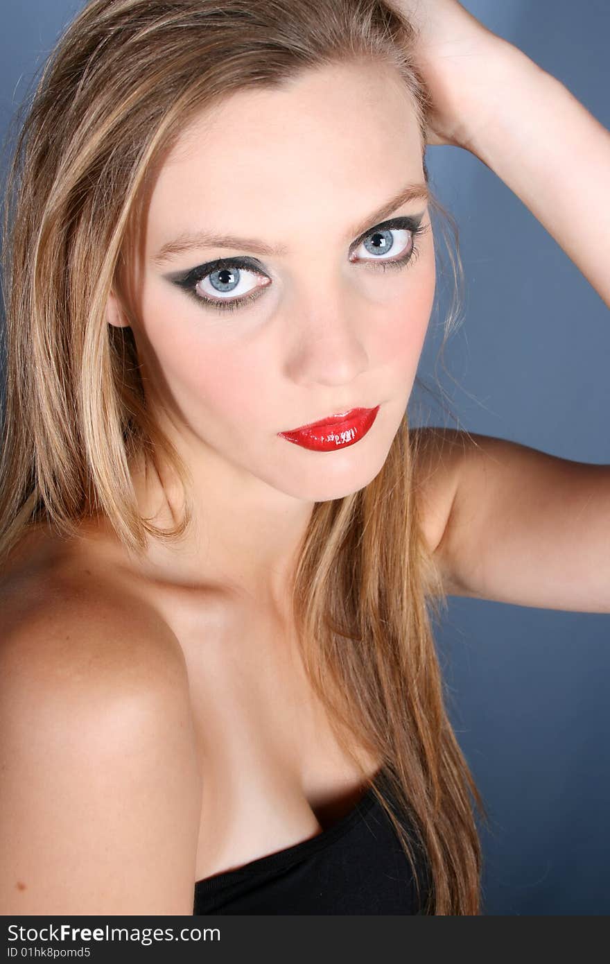 Beautiful young female model with dark make-up