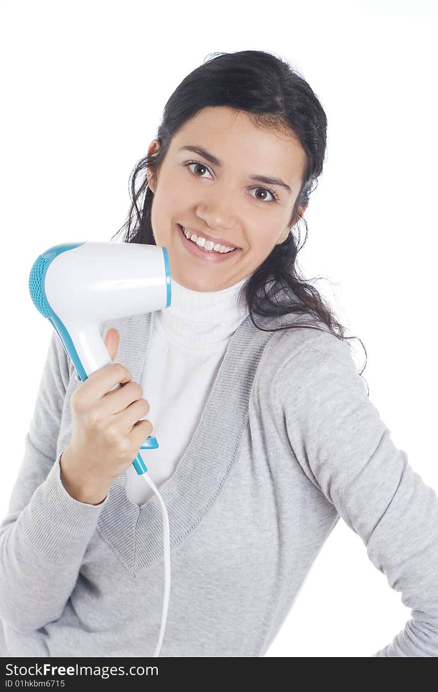 Young woman drying hair, isolated on white background