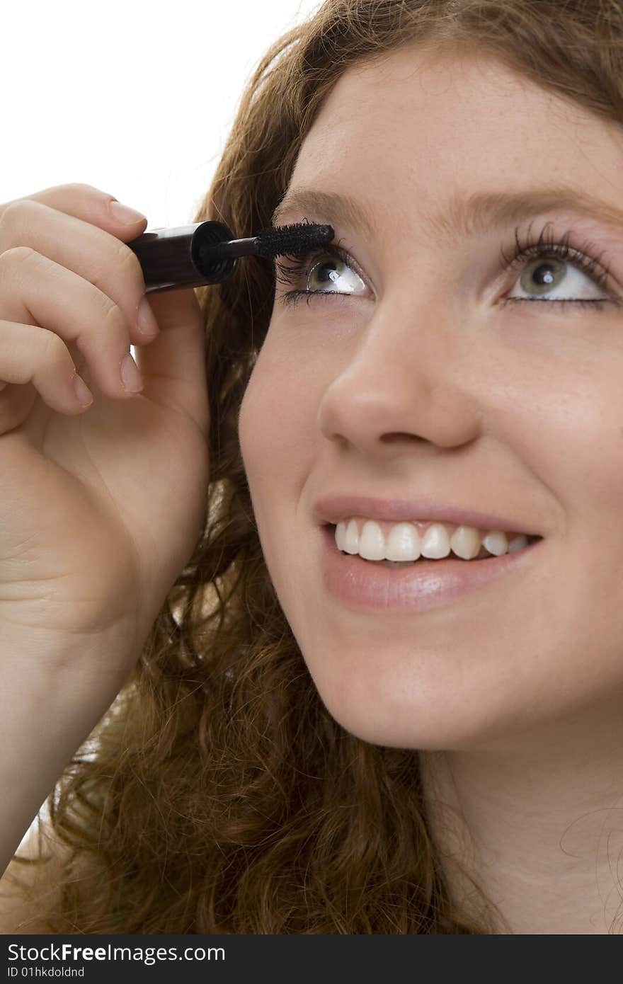 Red haired female teenager with mascara