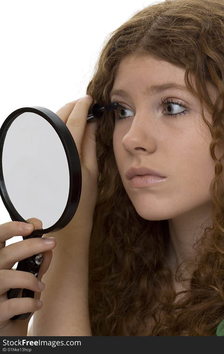 Red haired female teenager with mascara