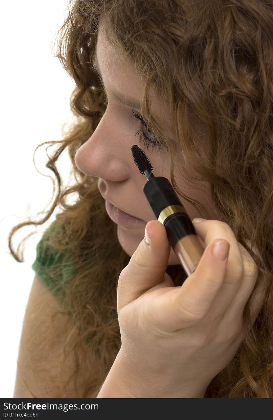 Red haired female teenager with mascara