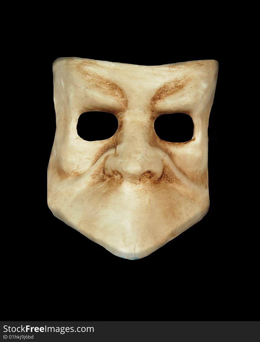 Venetian Mask isolated on a black background.