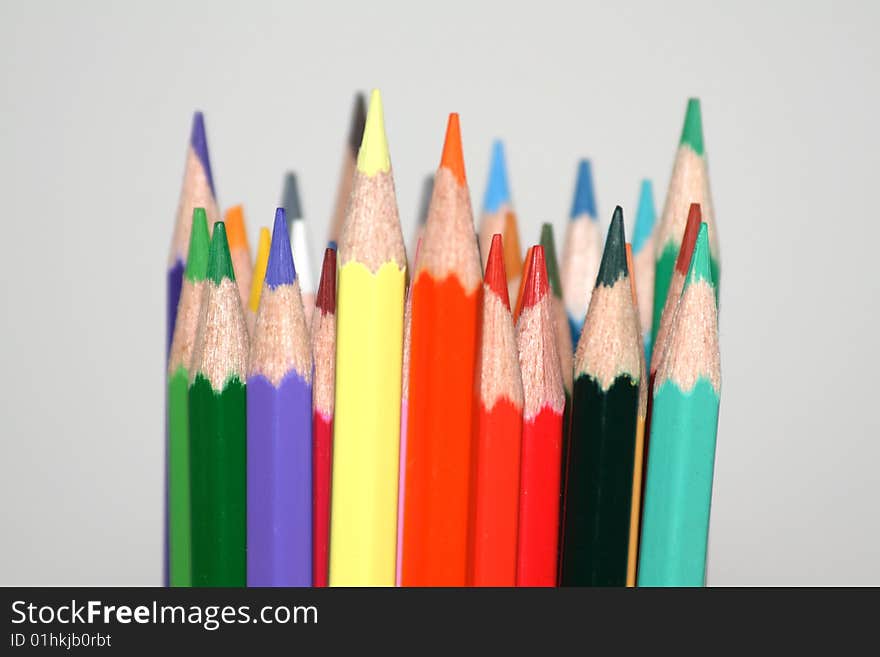 Color pencils arranged in a bundle.