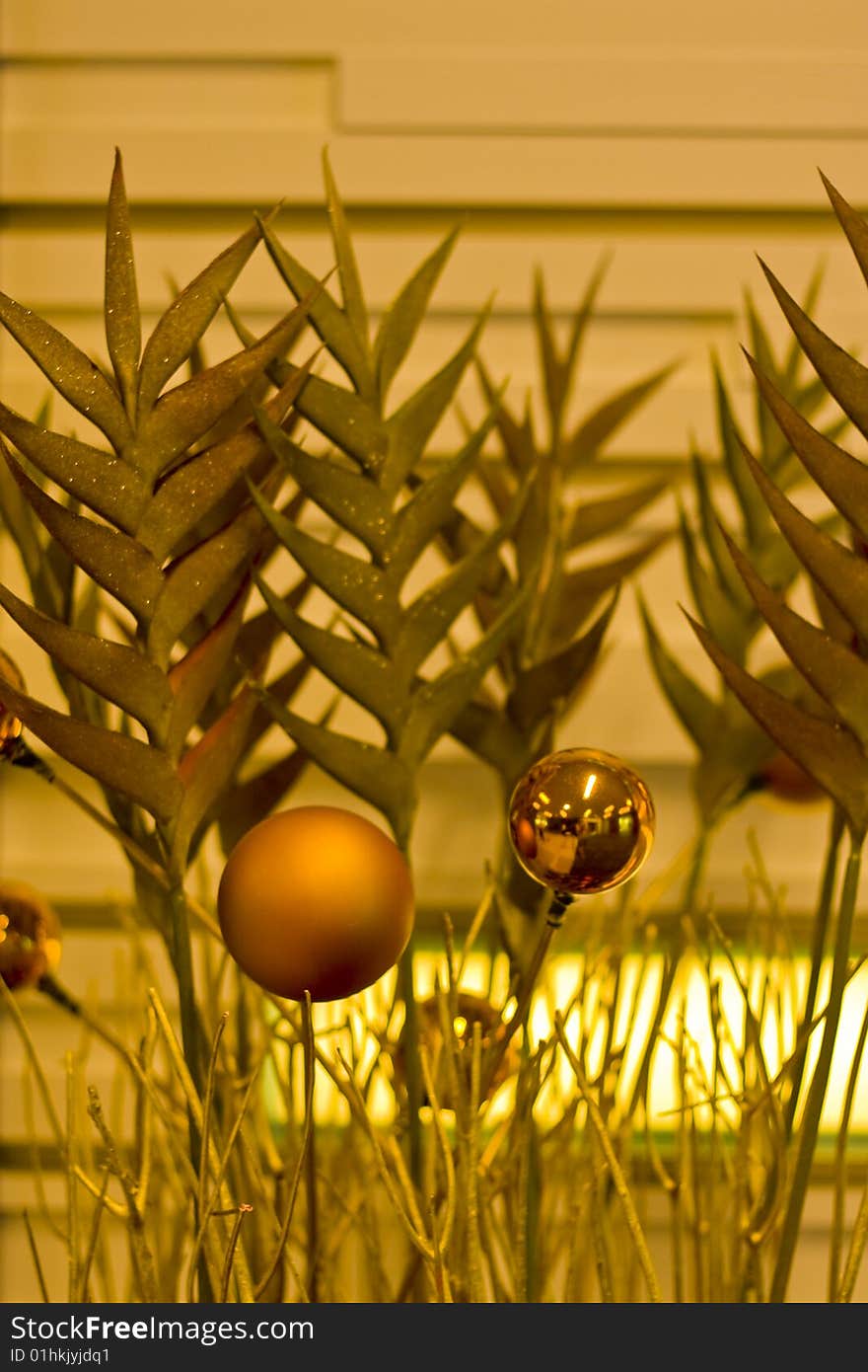 Gold ornaments in a Christmas decoration