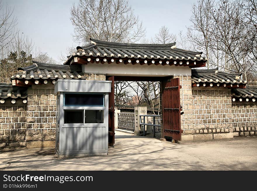 Asian Palace Gate with modern police box