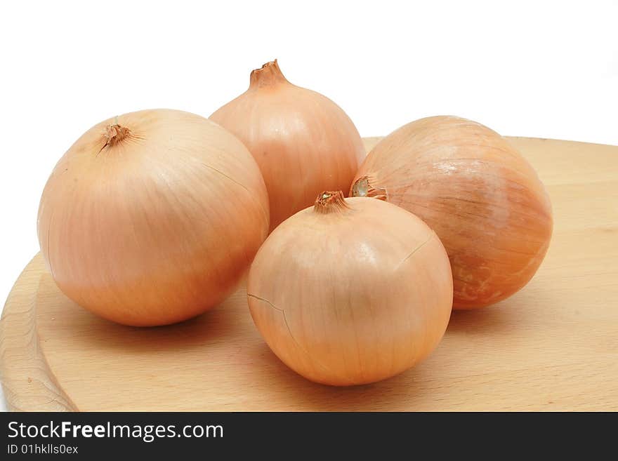 Onions on the kitchen plank