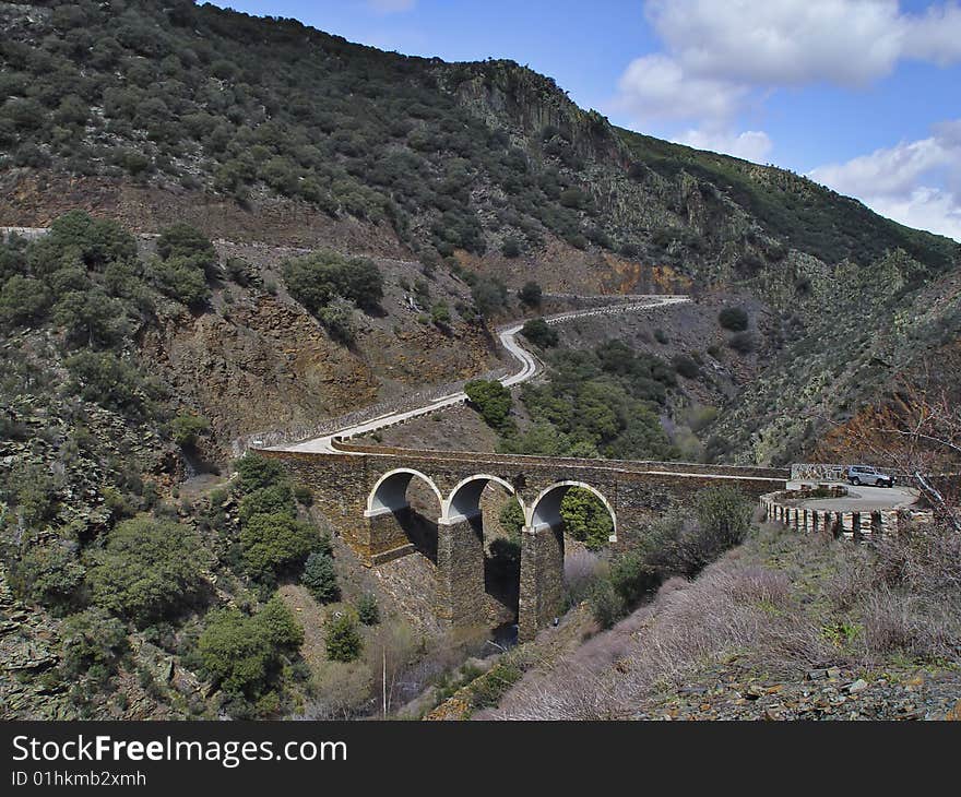 Among the peoples of Corralejo and Roblelacasa in the province of Guadalajara, Spain, there is this magnificent bridge over the river Jaramilla, a tributary of the river Jarama. Among the peoples of Corralejo and Roblelacasa in the province of Guadalajara, Spain, there is this magnificent bridge over the river Jaramilla, a tributary of the river Jarama