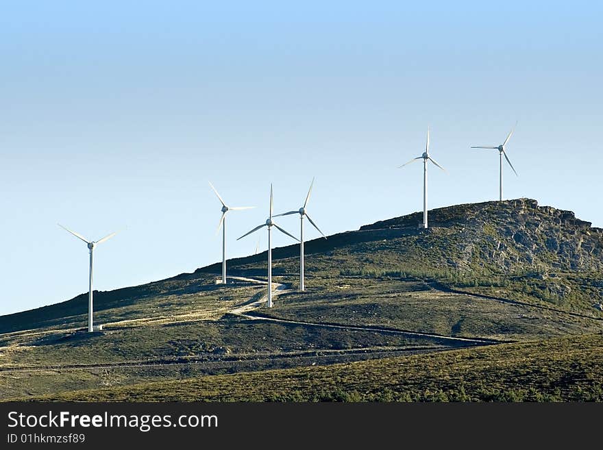 Wind energy - Field wind farm in the mountains. Wind energy - Field wind farm in the mountains