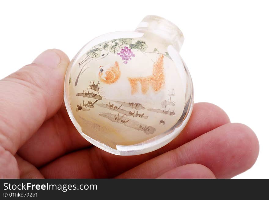 Snuff bottle with inside painting on hand.It has more than 100 years of history.