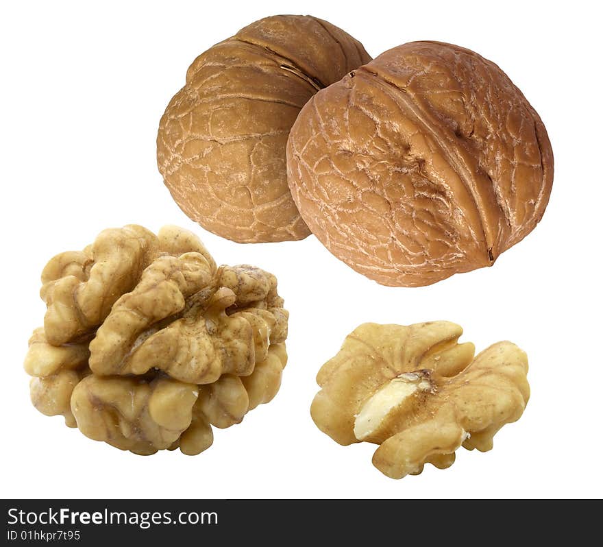 Whole and hulled walnuts isolated over white background